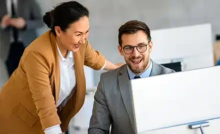 People looking at a screen for best practices