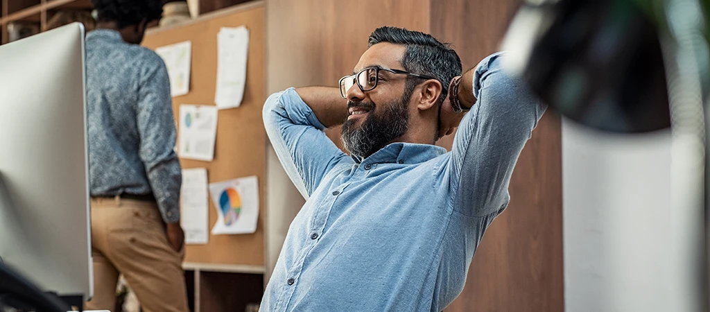 man relaxing at work benefits of accounts payable automation solutions cevinio post