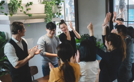 coworkers clapping cevinio accounts payable automation